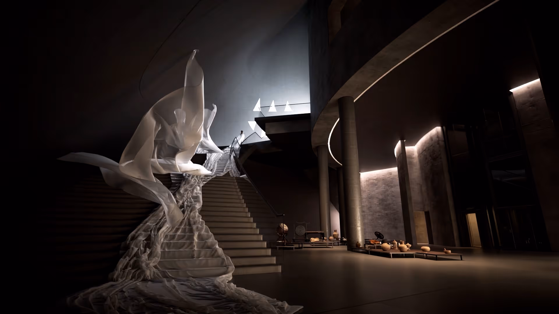 Dramatic museum lobby with a sculptural installation