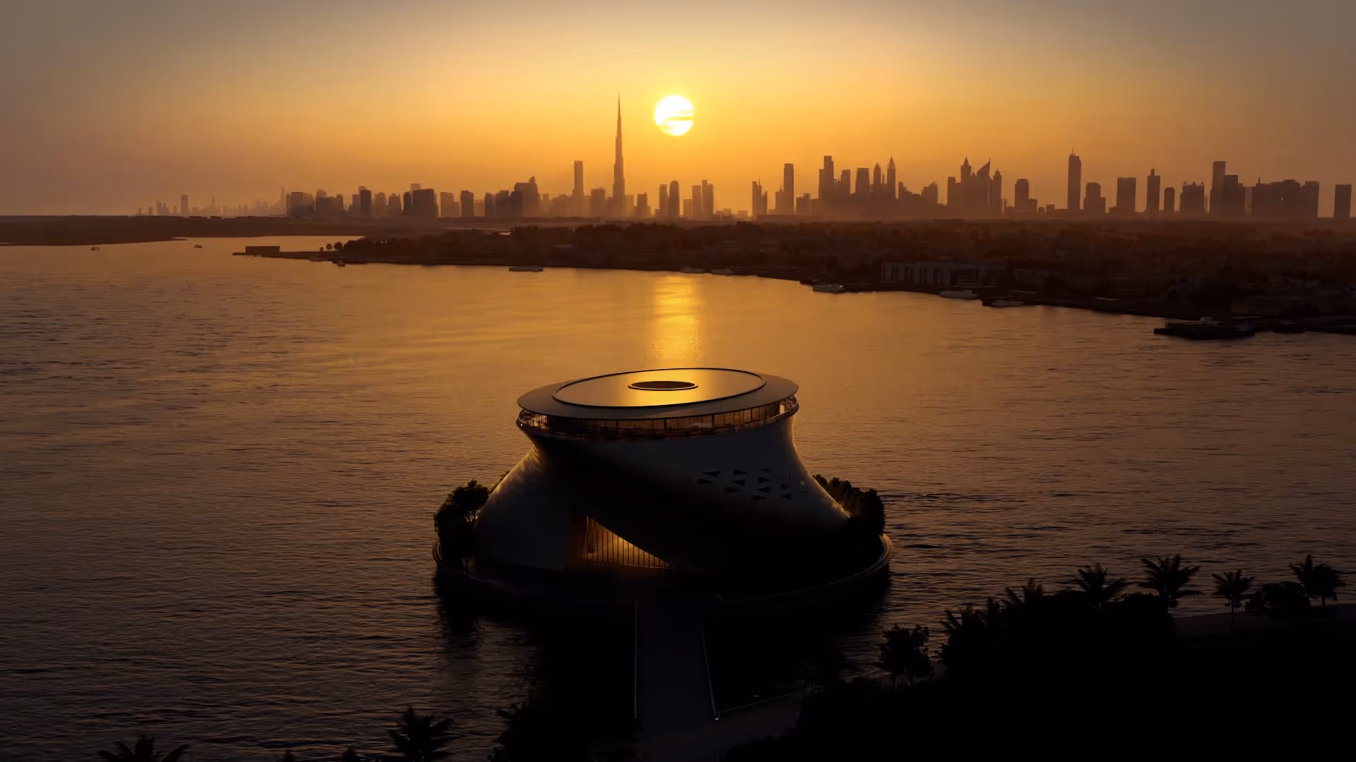 Museum and Dubai skyline at sunset
